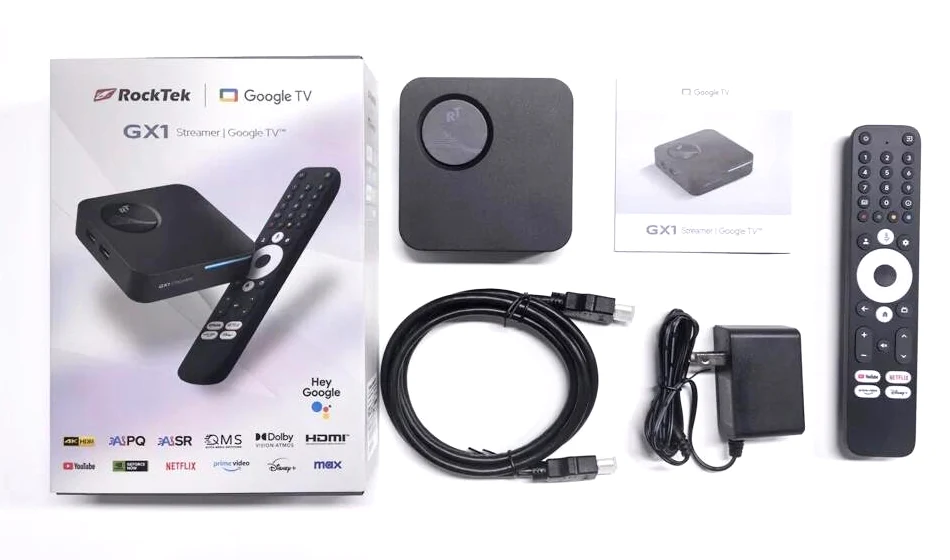 Rocktek GX1 komplektas: dėžutė, priedėlis, pultas, HDMI laidas, maitinimo adapteris ir instrukcija