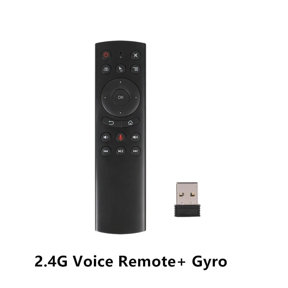 A black remote control with various buttons, including a circular OK button and a microphone, alongside a small USB receiver, labeled '2.4G Voice Remote+ Gyro' at the bottom.