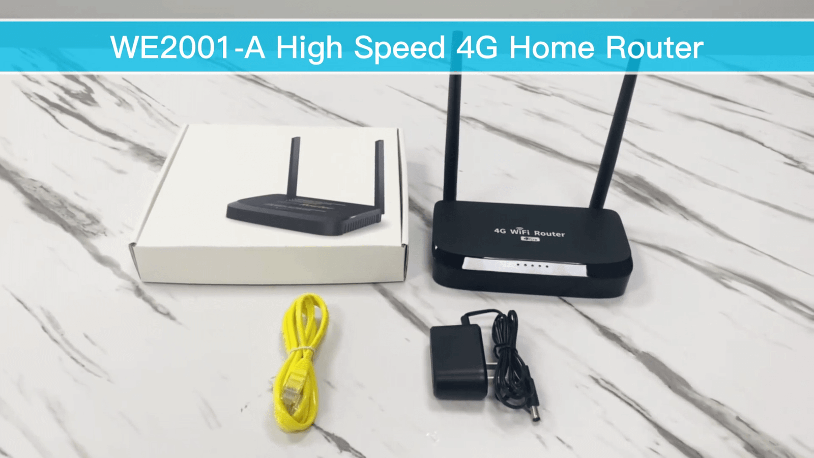 4G LTE Wi-fi maršrutizatorius - modemas WE2001 3 A black 4G Wi-Fi router with two antennas sits next to its white packaging, along with a yellow Ethernet cable and a black power adapter, all on a marble surface.